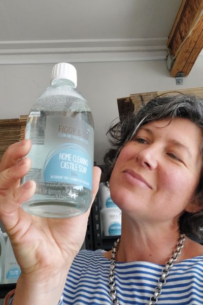 Jane from Figgy and Co holding Figgy & Co's batch-made castile soap for cleaning