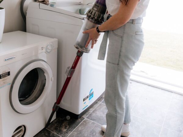 Vacuuming around the Clothes Dryer