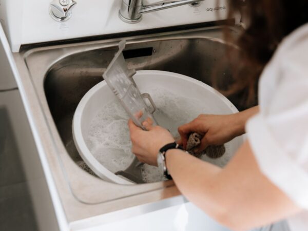 Washing Clothes Dryer Filters in Figgy & Co Home Cleaning Castile Soap