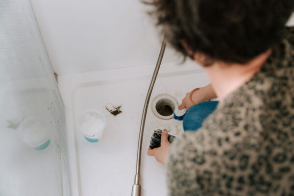 Clean your shower drain regularly to avoid a big mess later
