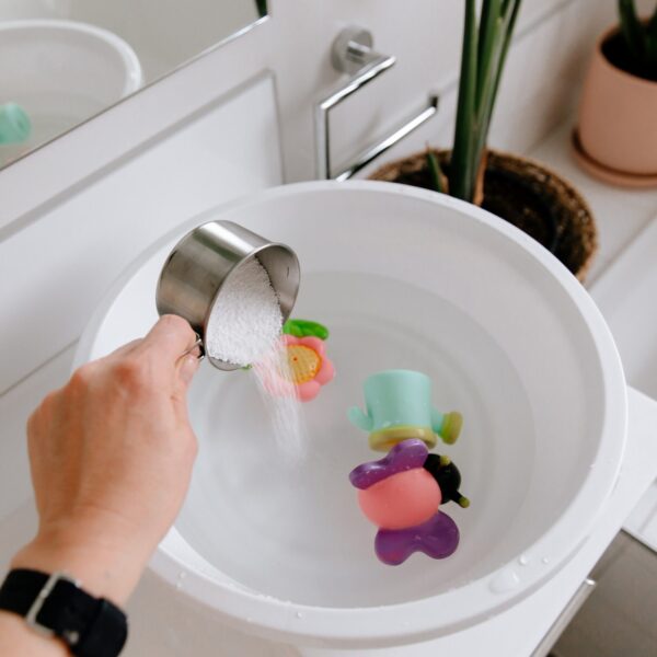 Soaking Bath Toys and cleaning naturally in Figgy & Co's Oxygen Bleach 